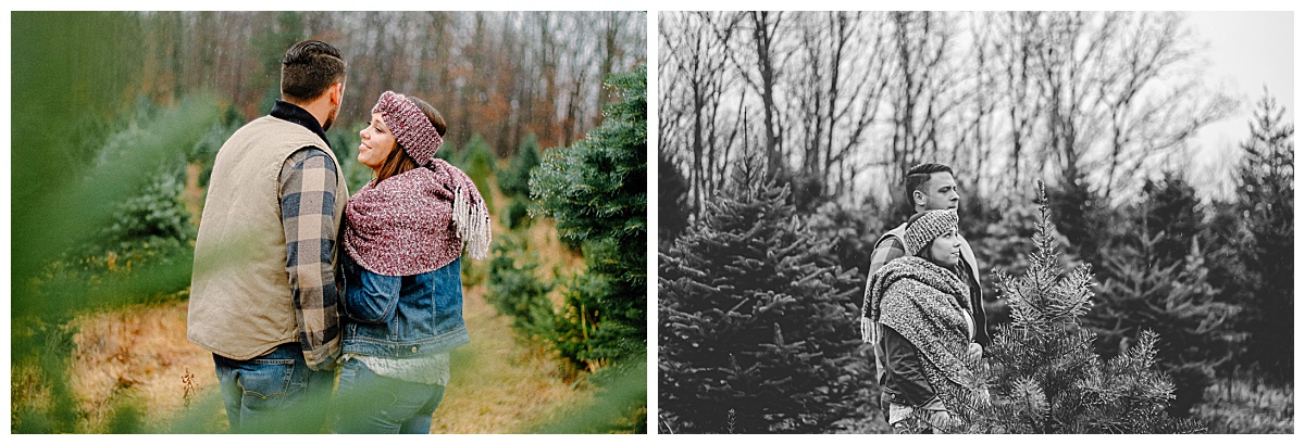 Couple laughing together during a Christmas tree farm photoshoot in Upstate New York
