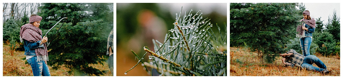 Man cutting down a Christmas tree while his partner watches during a couples photoshoot in Upstate NY